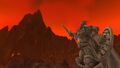 The statue's sword is raised in an eternal charge toward Blackrock Mountain.