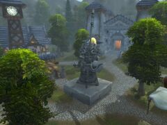 A statue of Tirion Fordring wielding Ashbringer in Hearthglen.