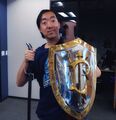Rygarius during his last week at Blizzard in July 2016, with his commemorative 5-year sword and 10-year shield.